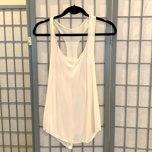 Silky cream very loose fitting Onzie tank.